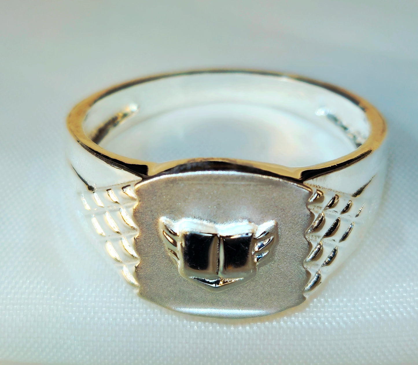 Silver Winged Shield Signet Ring with Diamond-Pattern Shoulders