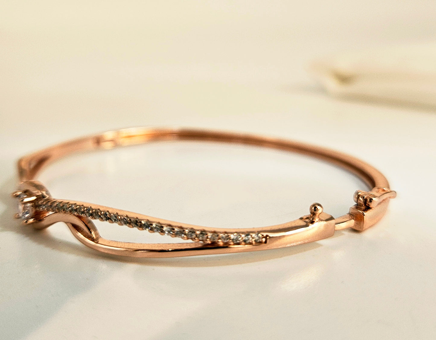 Interlocking Wave Rose Gold Bracelet