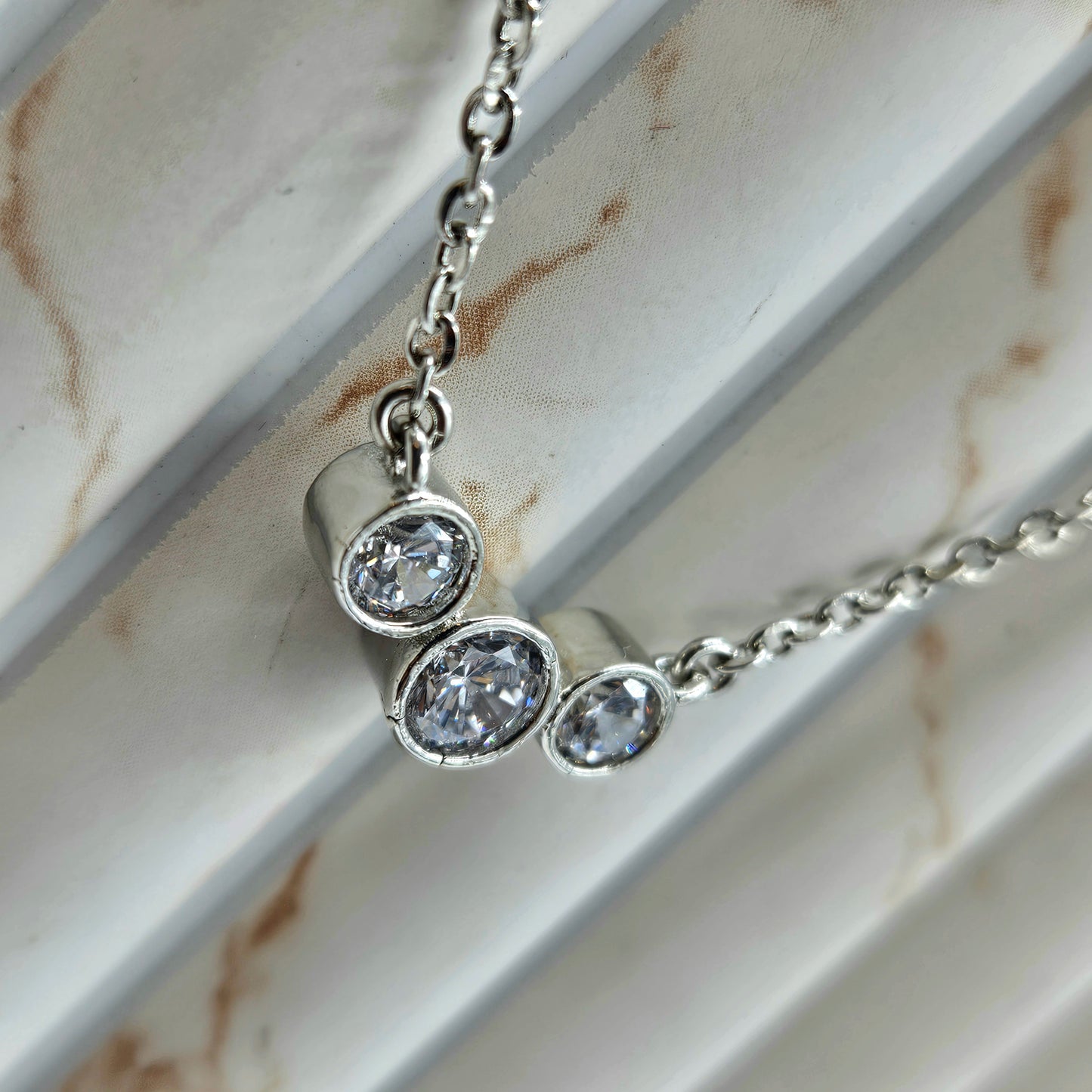 Modern Three-Stone Bezel Set Journey Pendant