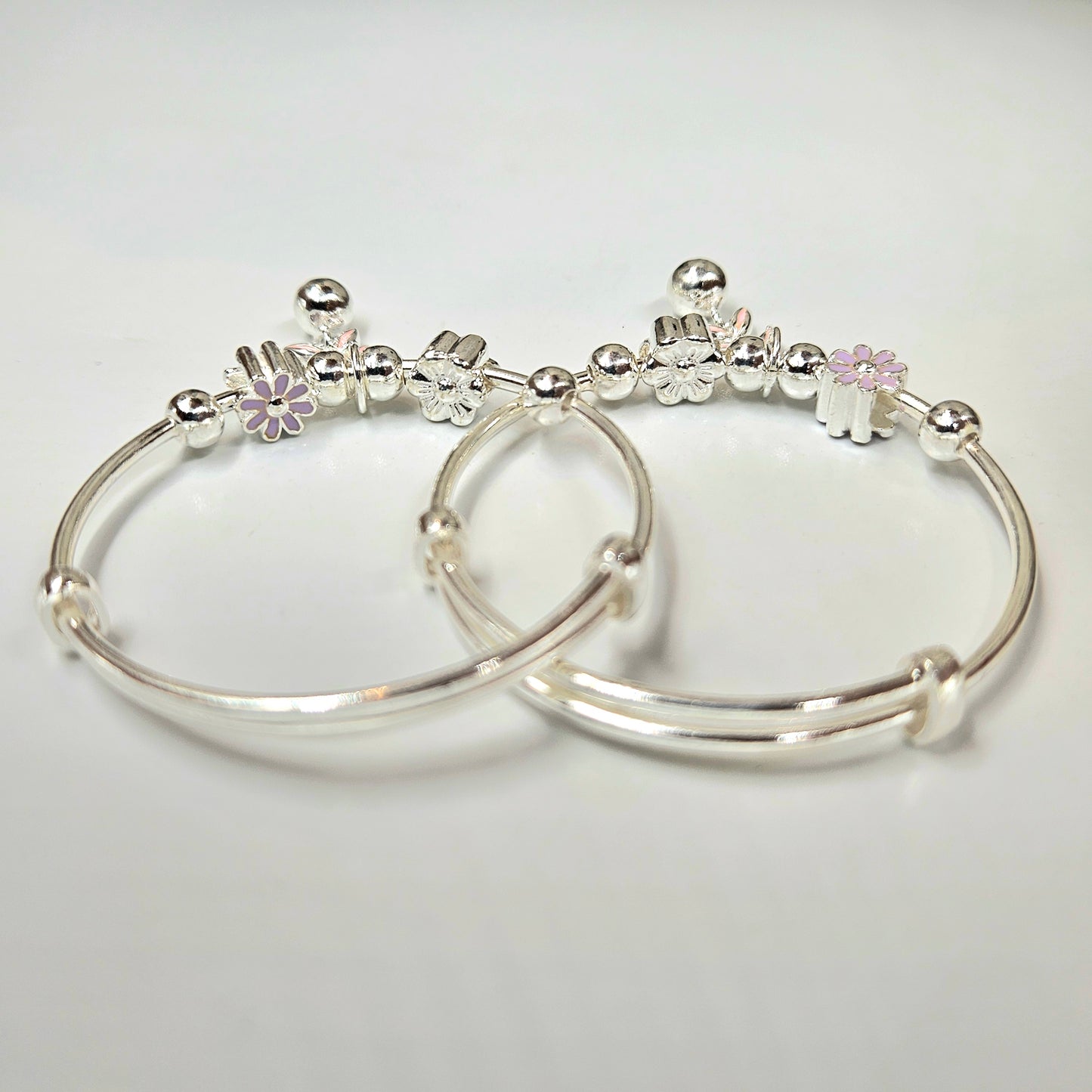 Silver Baby Bangles with Floral Charms and Jingle Bell