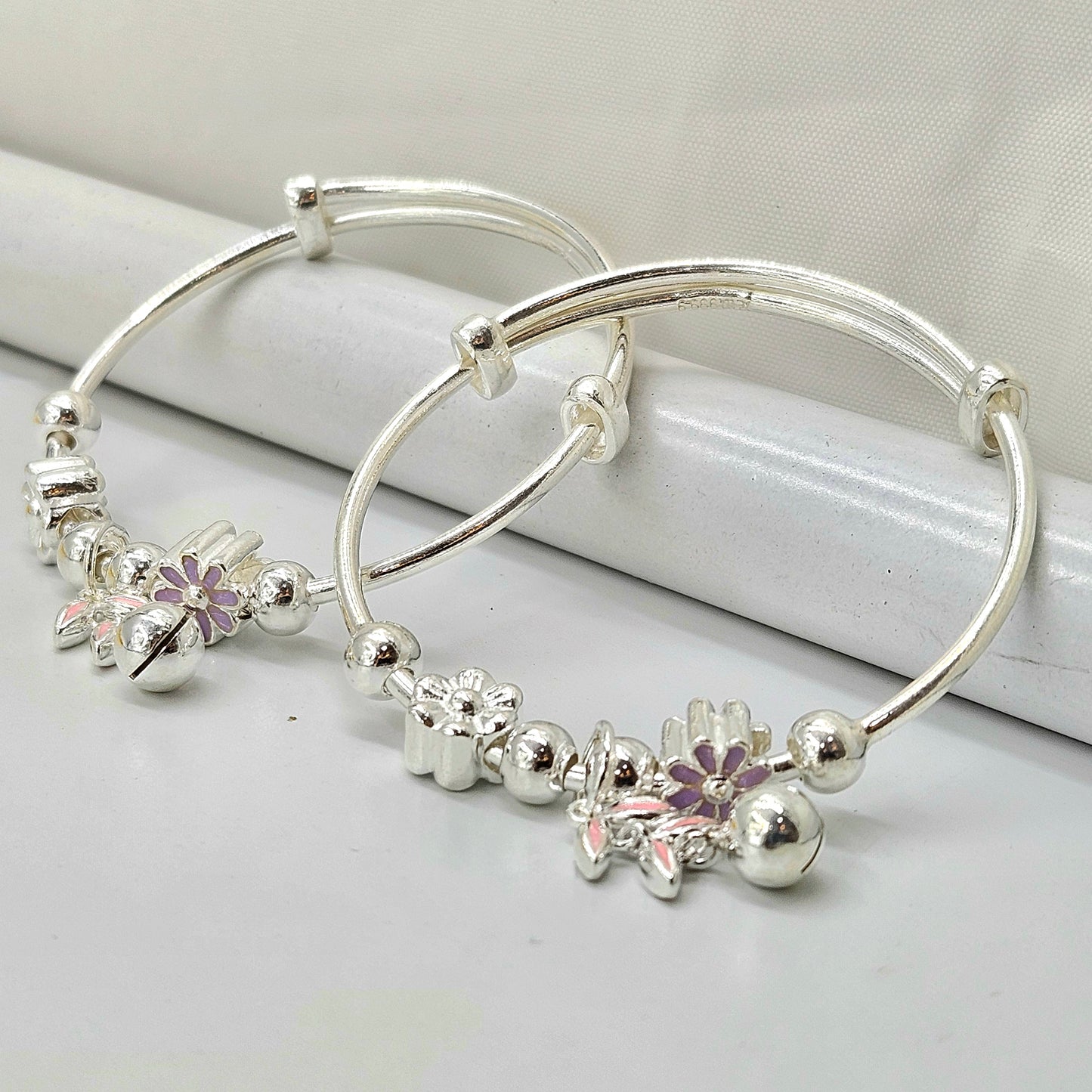 Silver Baby Bangles with Floral Charms and Jingle Bell