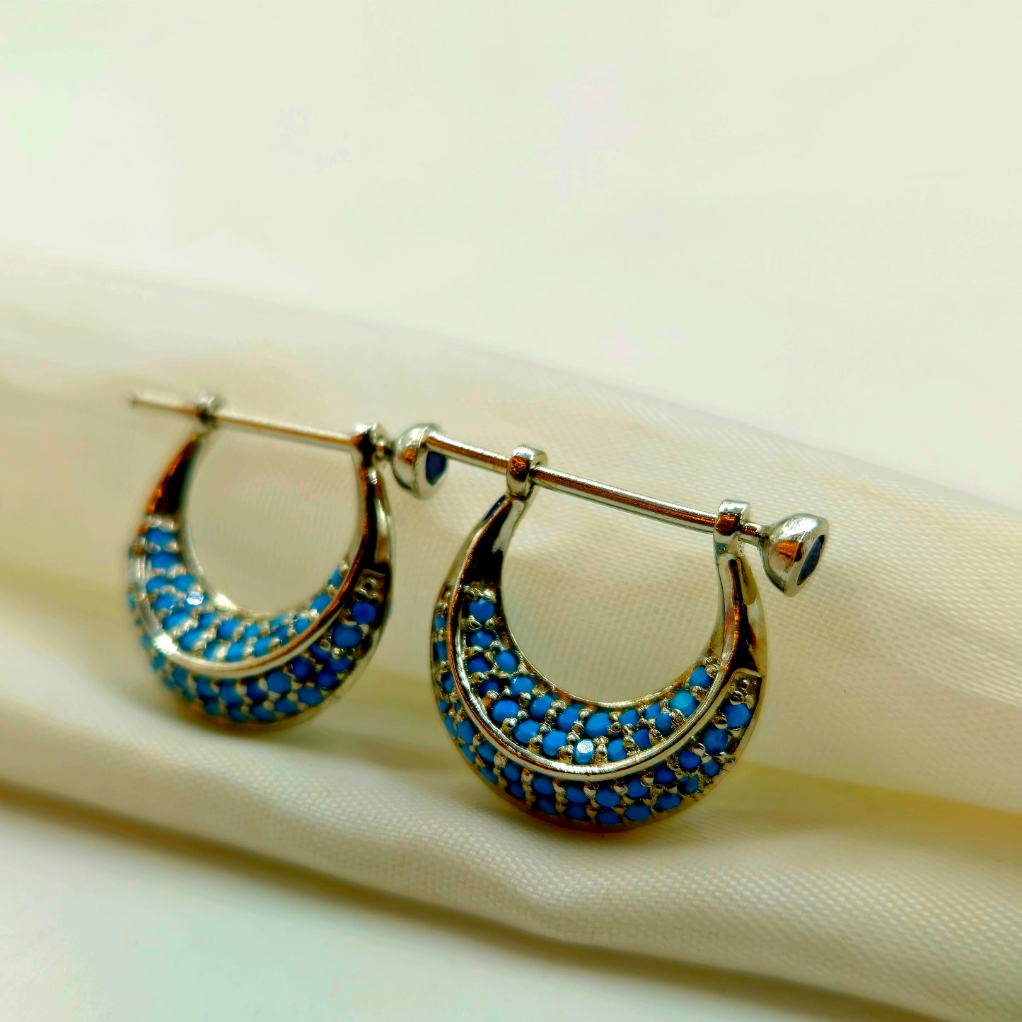 Silver Turquoise Pave Huggie Hoop Earrings.