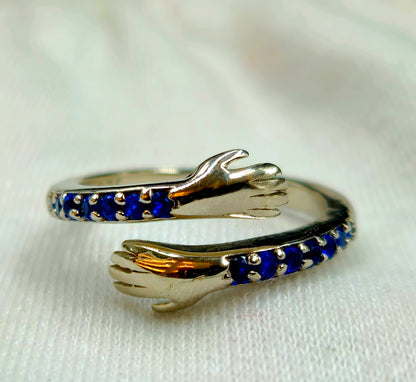 Blue Gemstone Hugging Hands Ring