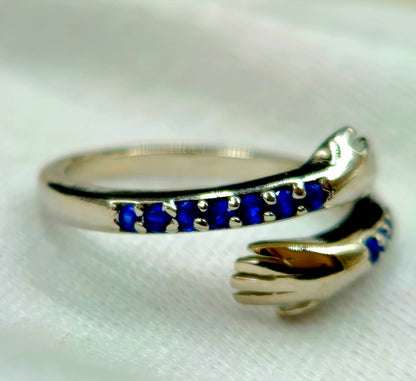 Blue Gemstone Hugging Hands Ring