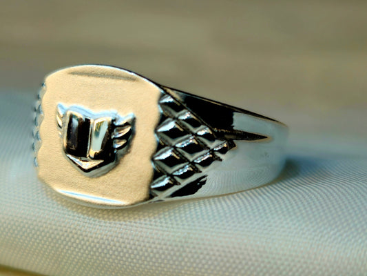 Silver Winged Shield Signet Ring with Diamond-Pattern Shoulders