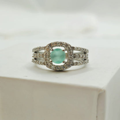 Green Gemstone Halo Ring With A Pave Split-Shank Band