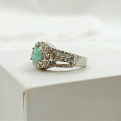 Green Gemstone Halo Ring With A Pave Split-Shank Band
