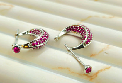 Silver Pave Ruby Huggie Hoop Earrings.