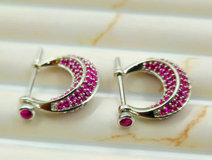 Silver Pave Ruby Huggie Hoop Earrings.