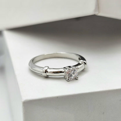 Solitaire Ring With A Distinctive Wrapped Shoulder Design