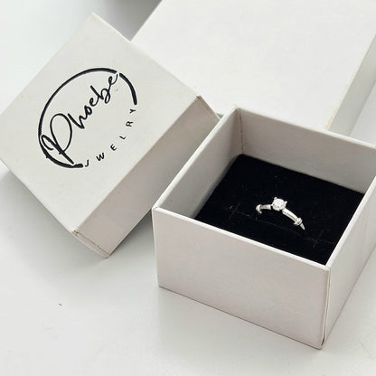 Solitaire Ring With A Distinctive Wrapped Shoulder Design