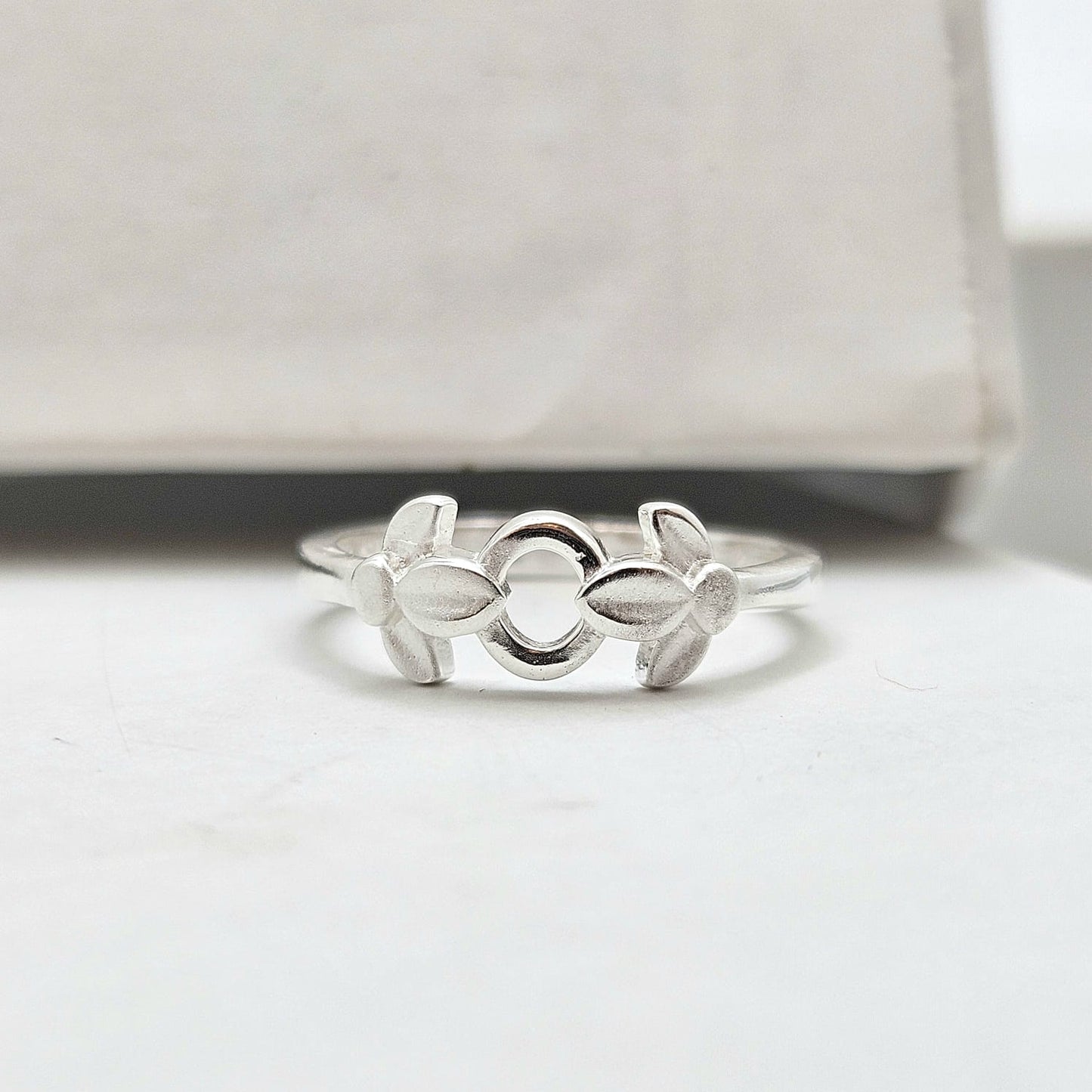Sterling Silver Baby Ring With A Floral Design