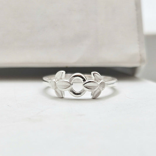 Sterling Silver Baby Ring With A Floral Design