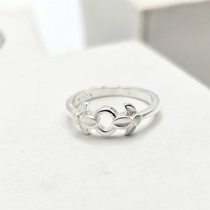 Sterling Silver Baby Ring With A Floral Design