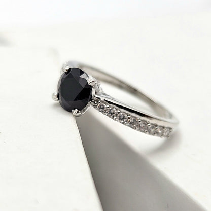 Black Gemstone Solitaire Ring With A Pave Band