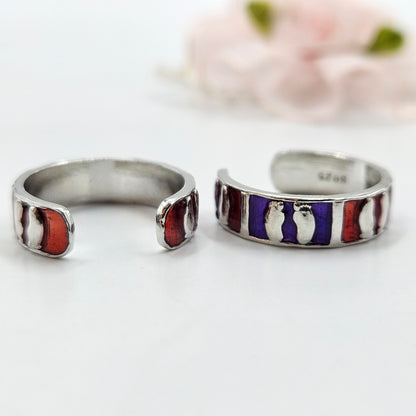 Silver baby footprint enamel toe ring